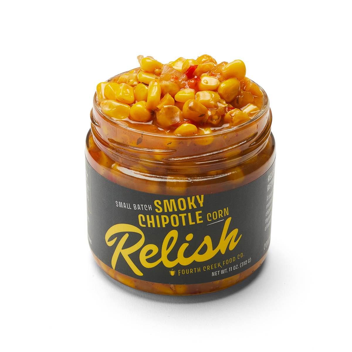 Open jar of Fourth Creek Smoky Chipotle Corn Relish, lid off, corn relish heaped above the rim